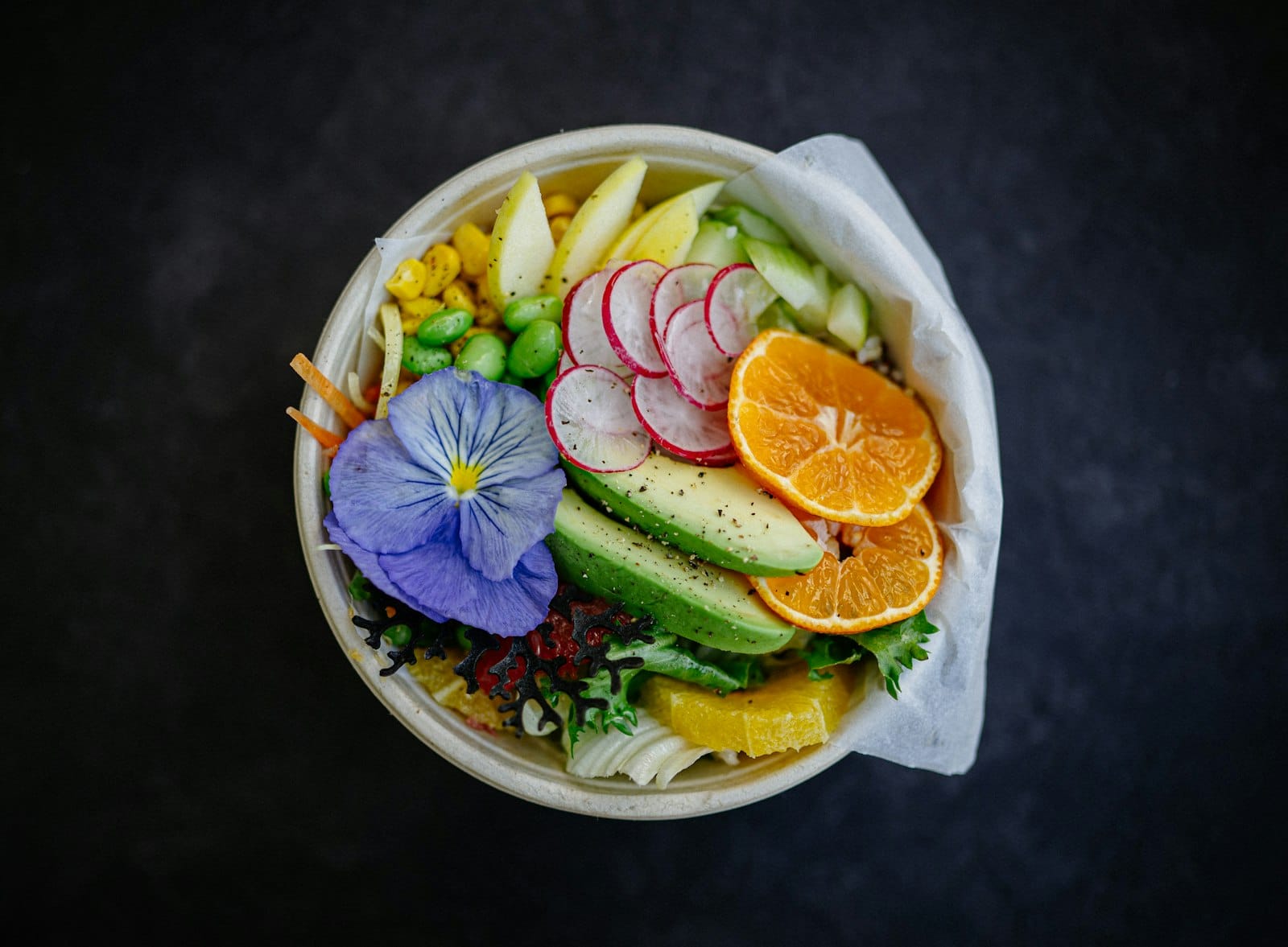 A colourful vegan bowl at a restaurant