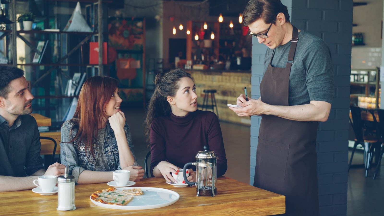 Ordering from a server at a cafe