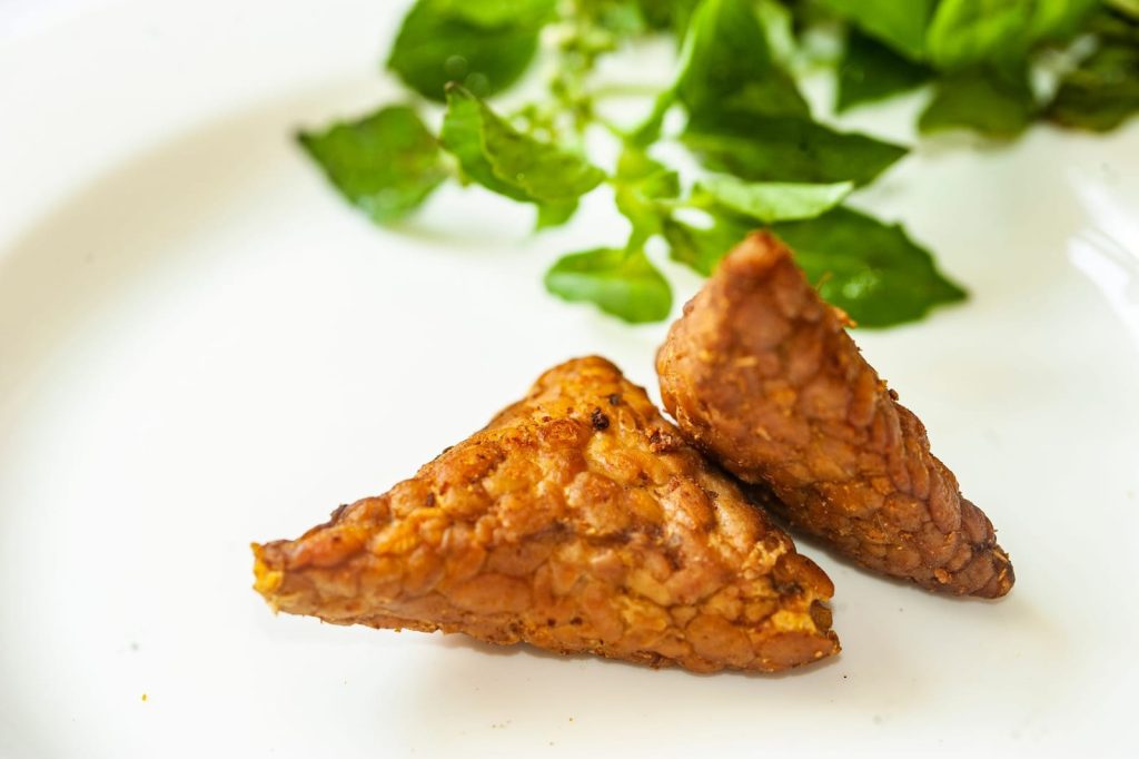 A fresh block of tempeh, a fermented soy protein