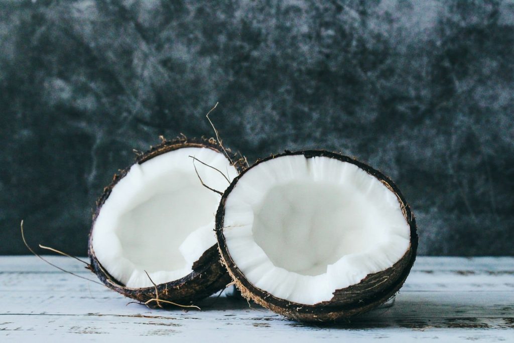 A fresh halved coconut