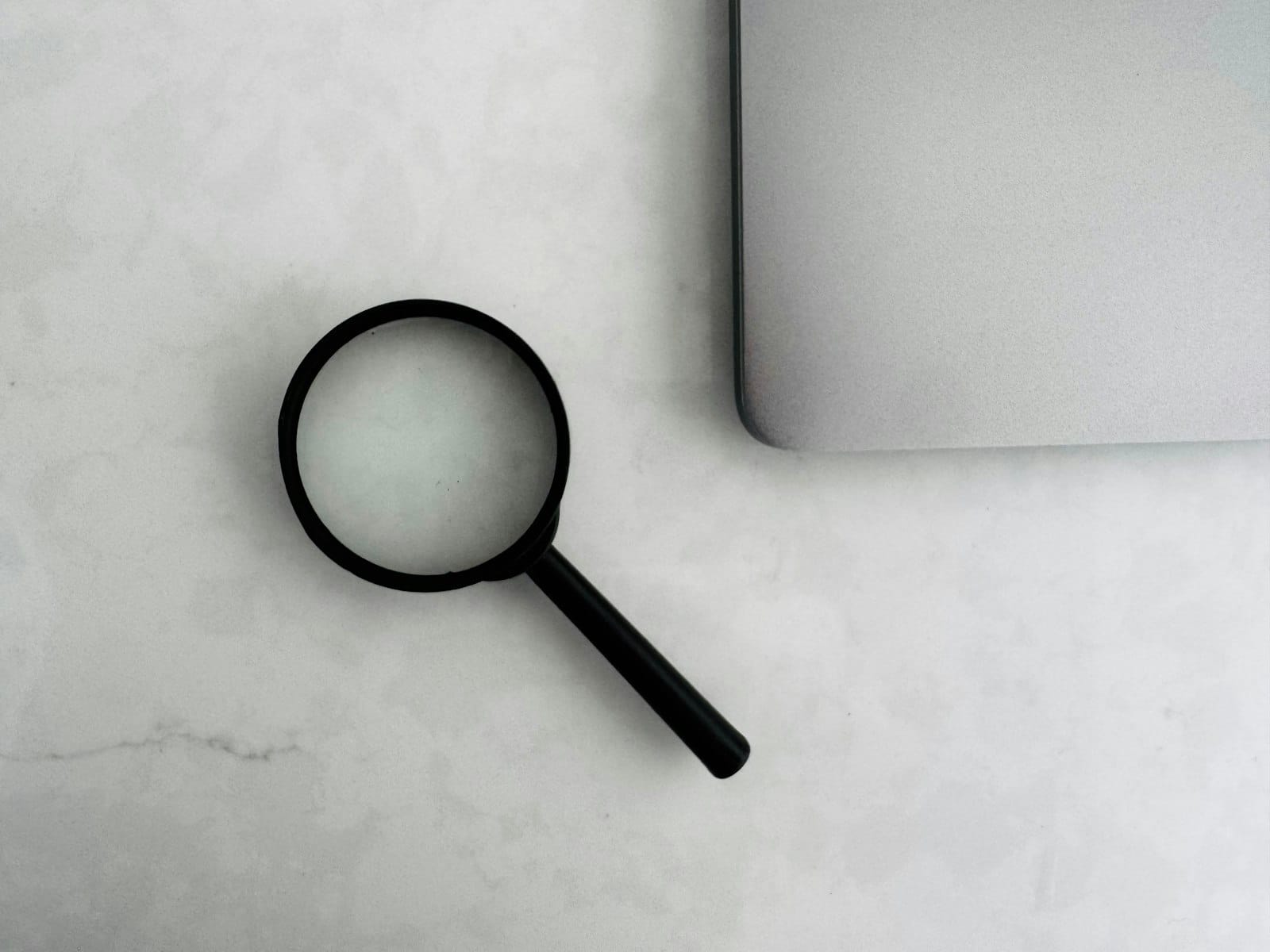 A magnifying glass reading a label